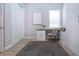 Bright office space with modern desk, storage, and natural light at 16913 Clear Cork Dr, Wimauma, FL 33598