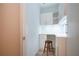Office nook featuring white cabinets and desk area at 16913 Clear Cork Dr, Wimauma, FL 33598