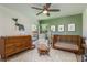 Charming Bedroom with modern furniture, complemented by adorable animal-themed decor and soft, neutral tones at 1793 Pipers Meadow Dr, Palm Harbor, FL 34683