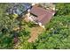 Spacious backyard with mature trees and a cozy fire pit area, perfect for outdoor entertaining at 1807 Tawnee Pl, Brandon, FL 33510
