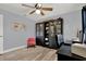 Bedroom with beautiful wood floors features a ceiling fan and lots of storage at 1807 Tawnee Pl, Brandon, FL 33510