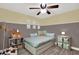 Comfortable bedroom featuring a twin trundle bed, neutral decor, and a ceiling fan at 1807 Tawnee Pl, Brandon, FL 33510