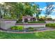 A beautifully landscaped Carriage Landing community entrance with mature greenery and manicured lawn at 1807 Tawnee Pl, Brandon, FL 33510