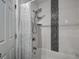 Contemporary bathroom showcasing a tiled shower with modern fixtures and a sleek shower curtain at 1836 Bough Ave # C, Clearwater, FL 33760