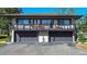 Two story home with a private second story balcony over a two car garage and an inviting curb appeal at 1836 Bough Ave # C, Clearwater, FL 33760