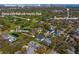 Aerial view of 1903 S Cardenas with a pool, golf course and downtown Tampa in the background at 1903 S Cardenas Ave, Tampa, FL 33629