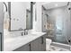 Sleek bathroom with glass shower and modern vanity at 1903 S Cardenas Ave, Tampa, FL 33629