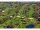 Aerial view of the meticulously kept green golf course at 1903 S Cardenas Ave, Tampa, FL 33629