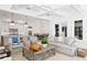 Open concept living room flows to kitchen and dining area at 1903 S Cardenas Ave, Tampa, FL 33629