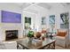 Bright living room showcasing a marble fireplace and stylish decor at 1903 S Cardenas Ave, Tampa, FL 33629