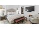 Serene main bedroom featuring a seating area and soft natural light at 1903 S Cardenas Ave, Tampa, FL 33629