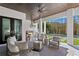 Inviting outdoor living space with a full kitchen, comfortable seating, and a swimming pool at 1903 S Cardenas Ave, Tampa, FL 33629