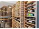 Spacious wine cellar featuring custom-built wooden racks filled with a wide selection of wines at 1903 S Cardenas Ave, Tampa, FL 33629