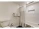Clean, modern bathroom with tub, shower, and tiled walls at 19925 Gulf Boulevard # 502, Indian Shores, FL 33785