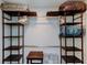 Spacious closet with shelving units and hanging rods for storage at 19925 Gulf Boulevard # 502, Indian Shores, FL 33785