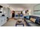 The open layout flows from the living area to the dining room, creating an inviting and spacious atmosphere at 19925 Gulf Boulevard # 502, Indian Shores, FL 33785