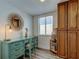 A charming office area includes a built-in cabinet and a window with plenty of light at 19925 Gulf Boulevard # 502, Indian Shores, FL 33785
