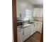 Bright kitchen with stainless steel appliances, granite counters, new cabinets and hardwood floors at 2007 W De Leon St # C, Tampa, FL 33606