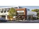 Exterior shot of a modern restaurant with outdoor seating and stylish awnings at 2007 W De Leon St # C, Tampa, FL 33606