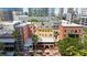 Stunning aerial view showcases buildings, local restaurants, and the cityscape at 215 Central Ave # 4F, St Petersburg, FL 33701