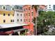 A vibrant view of the multi-colored building exteriors in a lively downtown area at 215 Central Ave # 4F, St Petersburg, FL 33701