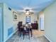 Inviting dining room boasts tiled floors and traditional wood furniture at 2348 Shelley St # 13, Clearwater, FL 33765