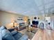 Comfortable living room features hardwood floors and comfortable seating furniture at 2348 Shelley St # 13, Clearwater, FL 33765