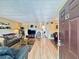 Bright open-concept living area with hardwood floors, views of living and dining spaces at 2348 Shelley St # 13, Clearwater, FL 33765