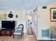 Cozy living room with hardwood floors, TV, and comfortable seating at 2348 Shelley St # 13, Clearwater, FL 33765