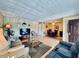Spacious living area with hardwood floors, comfortable seating, and dining space at 2348 Shelley St # 13, Clearwater, FL 33765