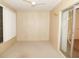 Carpeted bedroom with sliding glass doors for natural light and access to the outside at 2449 Columbia Dr # 53, Clearwater, FL 33763