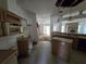 An open kitchen has ample counter space and a seamless transition to the dining area, blending functionality with design at 265 Corbett Rd, Lithia, FL 33547