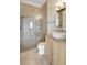 Bathroom featuring glass shower, wooden cabinets, and a vessel sink at 2863 Duncan Tree Cir, Valrico, FL 33594
