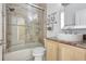 Bathroom featuring a shower-tub combination and a white vessel sink at 2863 Duncan Tree Cir, Valrico, FL 33594