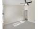 Bright bedroom with neutral carpet, white walls, and ceiling fan at 2863 Duncan Tree Cir, Valrico, FL 33594