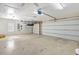 Spacious garage with multiple bays, offering ample room for vehicles and storage at 2863 Duncan Tree Cir, Valrico, FL 33594