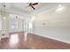 Bright and airy living room boasts hardwood floors, recessed lighting, and an open layout at 2863 Duncan Tree Cir, Valrico, FL 33594