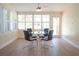 Cozy dining area filled with natural light from many windows at 340 81St Ave, St Pete Beach, FL 33706