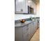 Modern kitchen featuring sleek countertops, stainless steel appliances, and ample cabinet space at 340 81St Ave, St Pete Beach, FL 33706