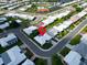 Aerial view of home in established community with mature trees and well-maintained landscaping at 3800 101St N Ter # 3800, Pinellas Park, FL 33782