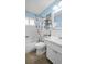 Bright bathroom with vanity, tub and nautical-themed décor at 3800 101St N Ter # 3800, Pinellas Park, FL 33782