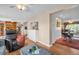 Open-concept living space with a bar area and views into dining areas and a living room at 3800 101St N Ter # 3800, Pinellas Park, FL 33782