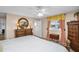 This main bedroom boasts ample natural light and attractive furnishings and decor at 3800 101St N Ter # 3800, Pinellas Park, FL 33782