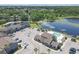 Enjoy this community's pool and parking spaces with beautiful views of the lake and mature trees from above at 3803 Cortez Cir # C, Tampa, FL 33614