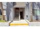 Facade of apartment building with steps to the front doors on the second floor at 3803 Cortez Cir # C, Tampa, FL 33614