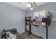 Bright home office with wood floors, a standing desk with dual monitors, and ample natural light at 3803 Cortez Cir # C, Tampa, FL 33614