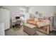 Charming bedroom with a daybed, desk, and neutral color scheme, perfect for relaxation or study at 3885 Timber Ridge Ct, Palm Harbor, FL 34685