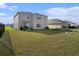 Enjoy this spacious backyard with a patio, perfect for relaxing and entertaining guests at 4114 Dovetail Ln, Palmetto, FL 34221