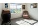 Bedroom with office space, chair, desk, and view of the backyard at 4114 Dovetail Ln, Palmetto, FL 34221