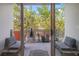 Relaxing balcony with outdoor seating and views of the surrounding greenery at 475 2Nd N St # 201, St Petersburg, FL 33701